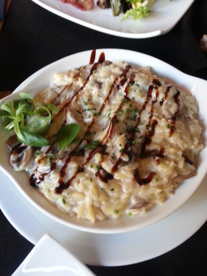 Risotto con jamón y portobello